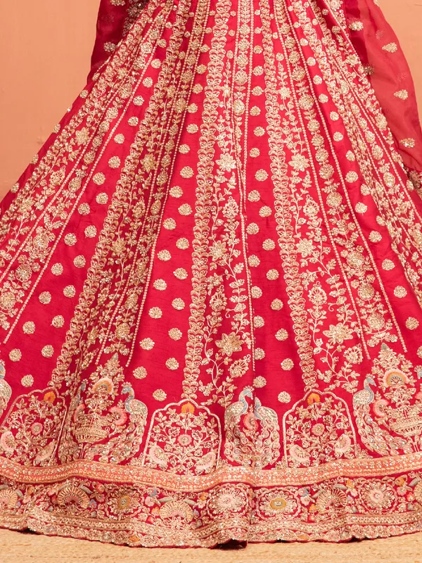 Pink raw silk bridal lehenga choli with boat neckline