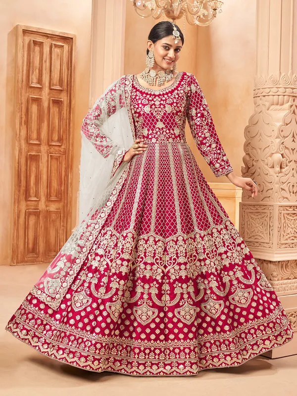 Pink round neck silk anarkali suit with zari detailing