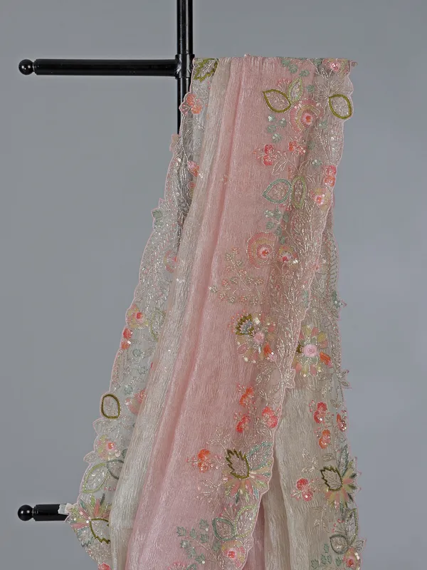 Pink shaded tissue silk saree with thread detailing