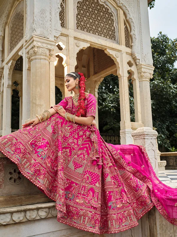 Pink silk bridal lehenga choli with resham and sequins work