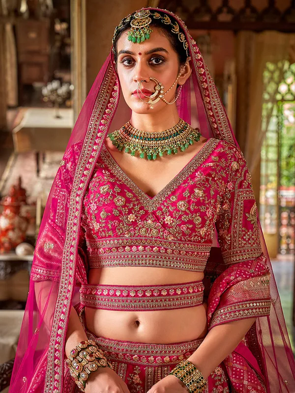 Pink silk bridal lehenga choli with resham embroidery