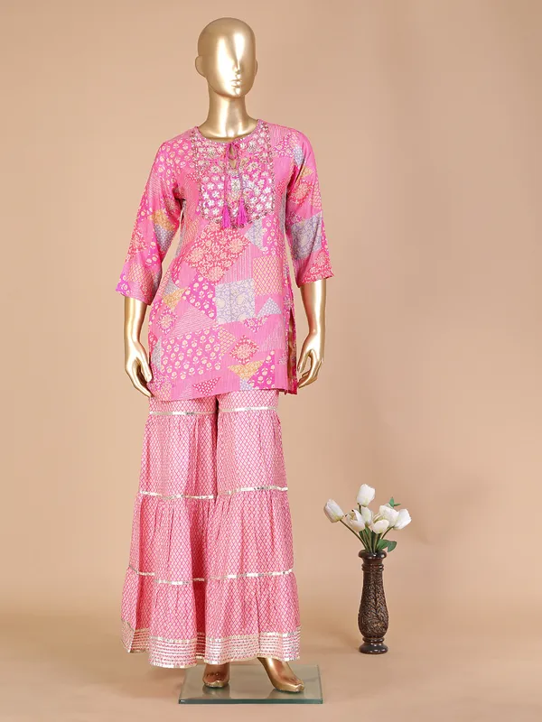 Pink silk printed sharara suit with dupatta