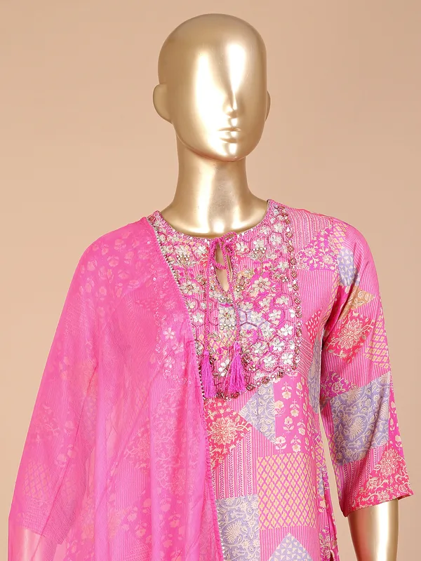 Pink silk printed sharara suit with dupatta