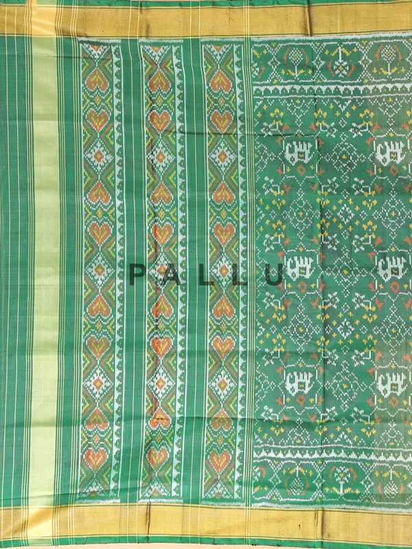 Dark green saree in bandhej silk for festive