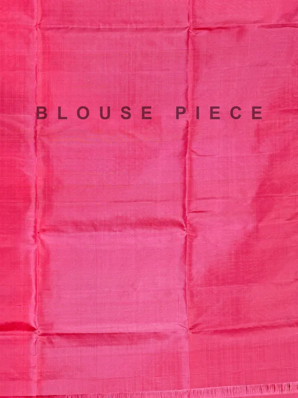 Pink silk saree with gleaming zari accents