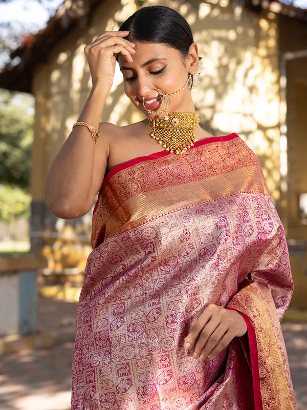Pink silk saree with golden zari weaving