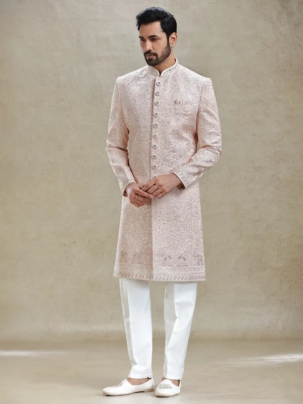 Pink silk sherwani in golden embroidery pattern
