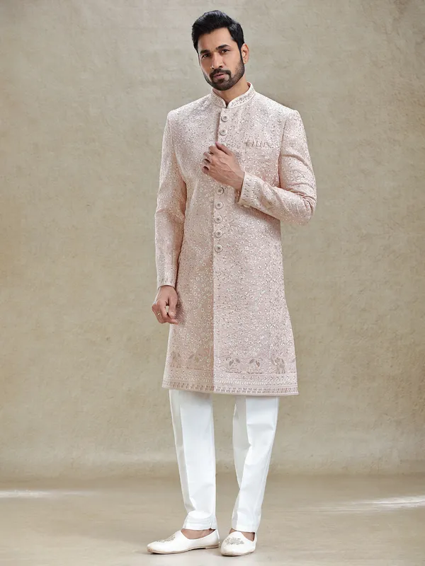 Pink silk sherwani in golden embroidery pattern