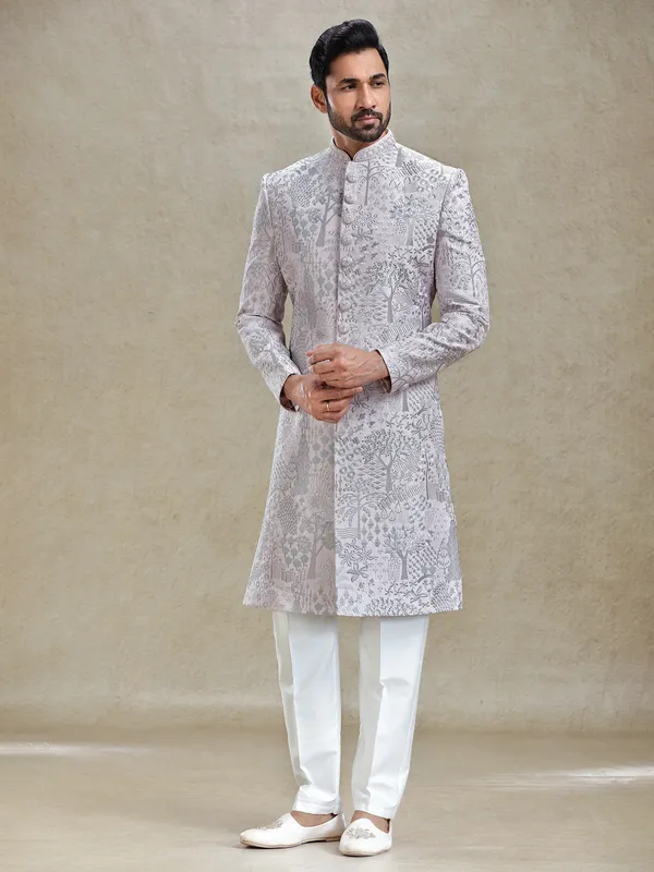 Pink silk sherwani in silver embroidery pattern