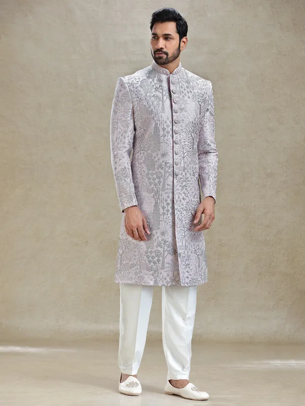 Pink silk sherwani in silver embroidery pattern