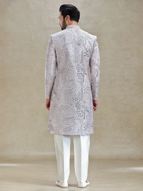 Pink silk sherwani in silver embroidery pattern