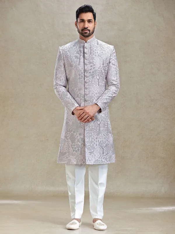 Pink silk sherwani in silver embroidery pattern