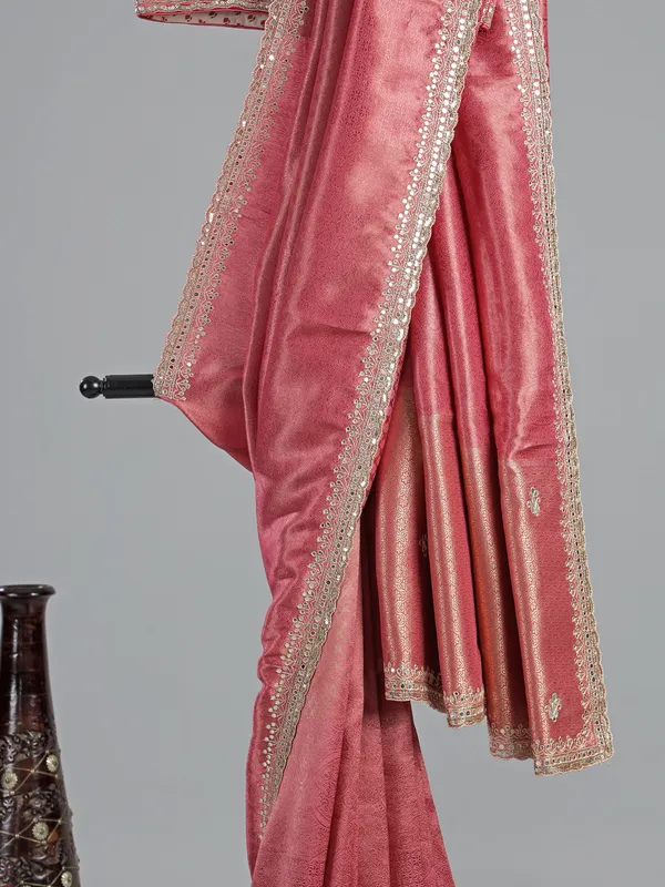 Pink soft tissue saree with cutdana V neck blouse