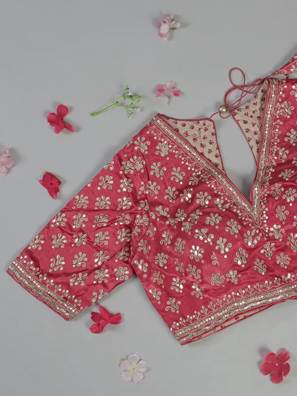 Pink soft tissue saree with cutdana V neck blouse