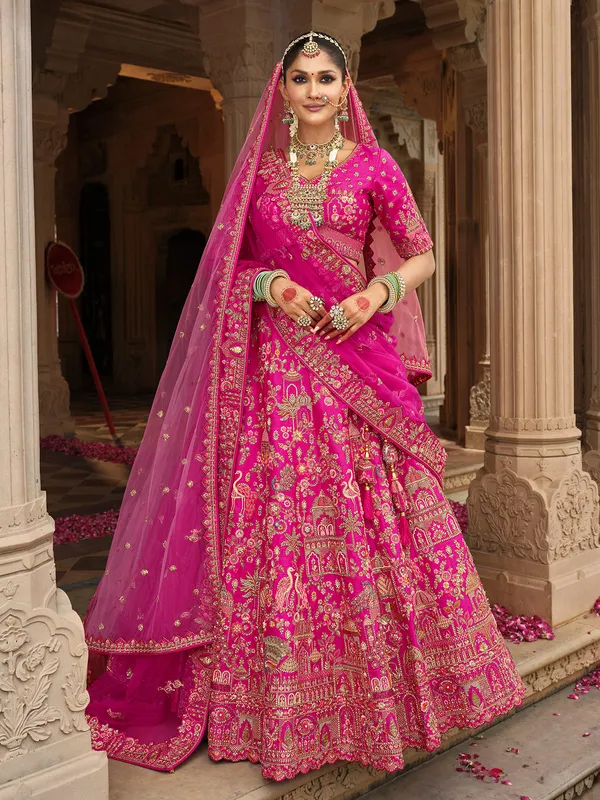 Pink thread work bridal lehenga in silk