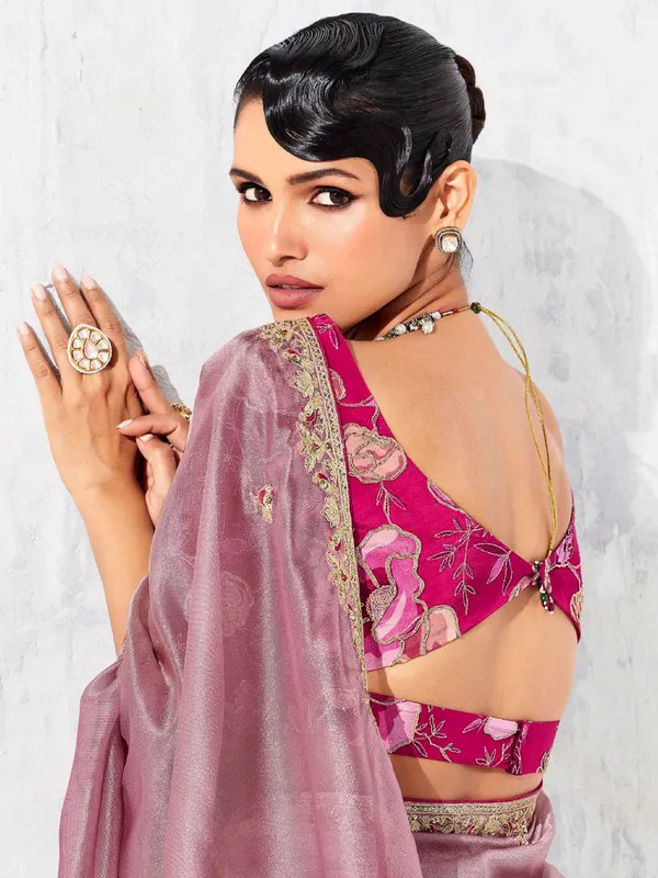 Pink tissue silk saree detailed with resham and sequins work