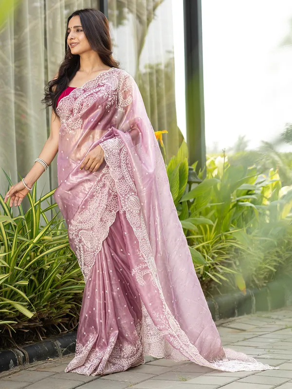 Pink tissue silk saree in thread weaving