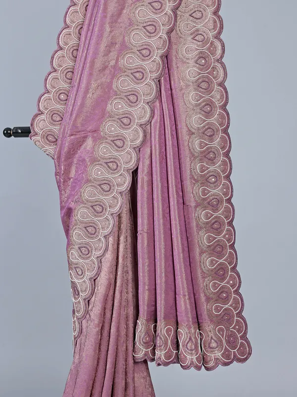 Pink tissue silk saree with unstitched blouse
