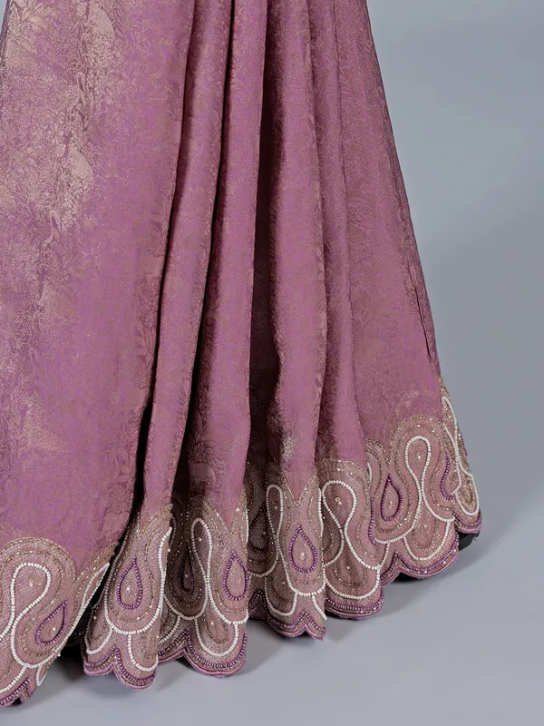 Pink tissue silk saree with unstitched blouse