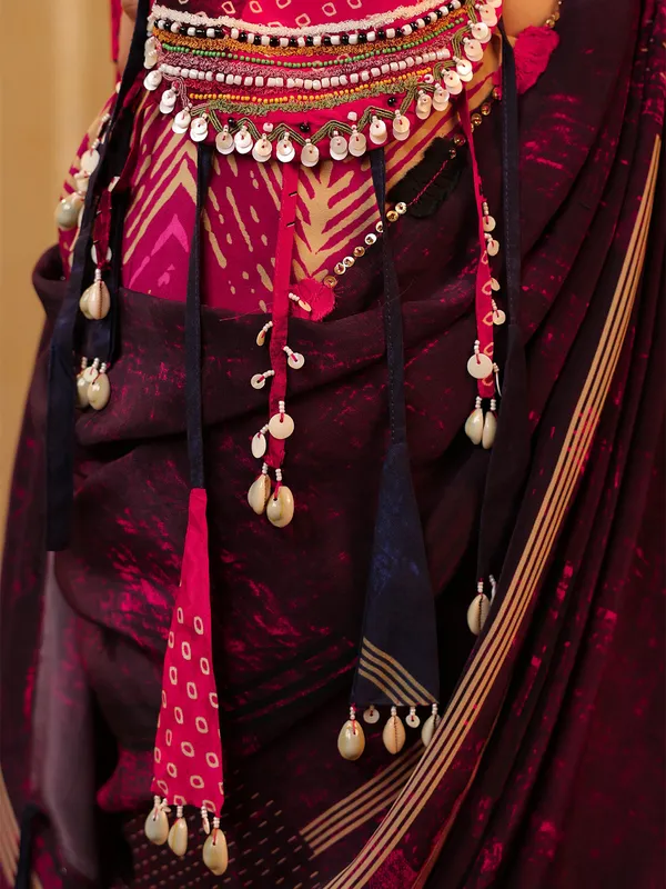 Pink trendy saree with embellished blouse