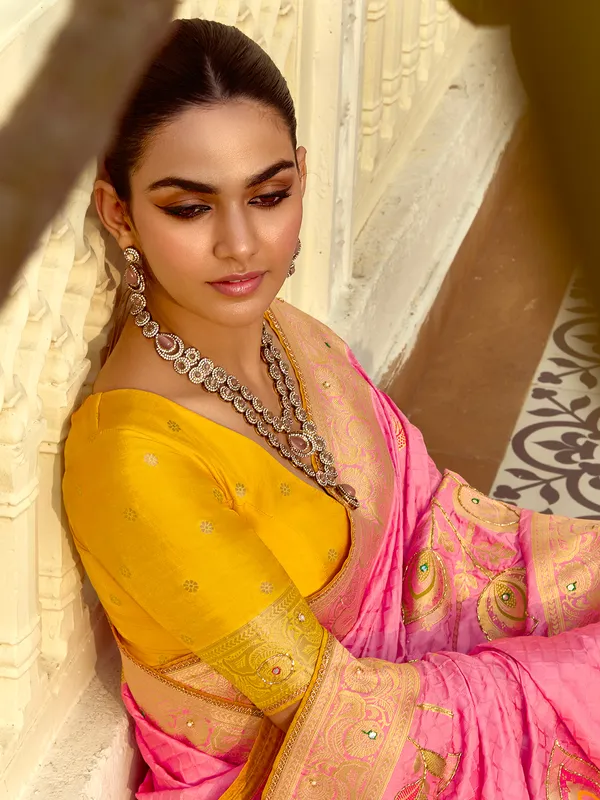Pink zari worked silk saree for reception wear