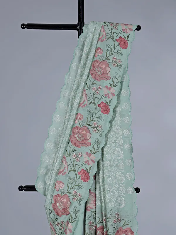 Pista green art silk saree with delicate embroidery charm