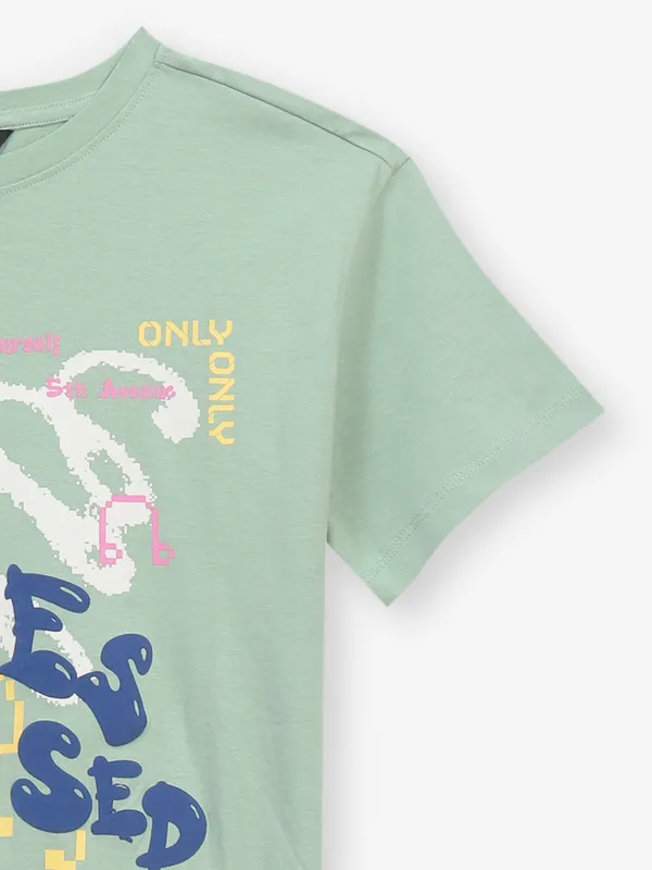 Pista green cotton printed top for women
