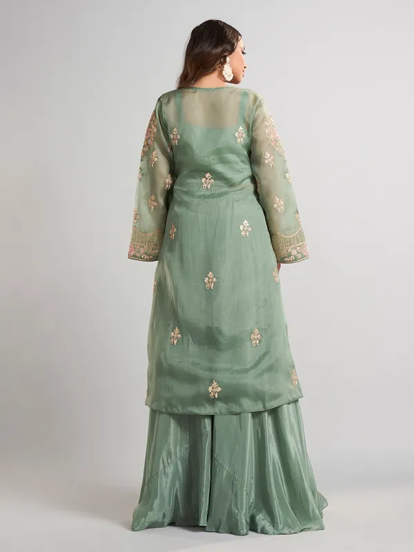 Pista green designer pakistani tissue and satin silk palazzo suit