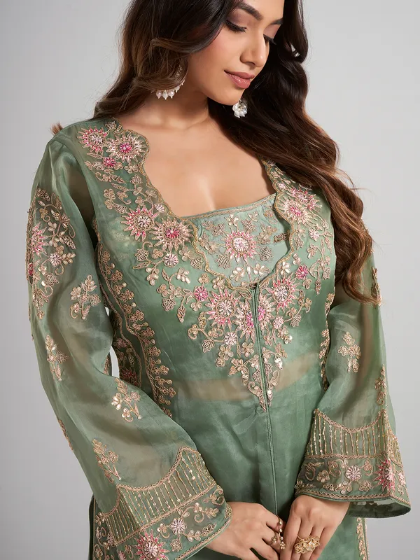 Pista green designer pakistani tissue and satin silk palazzo suit