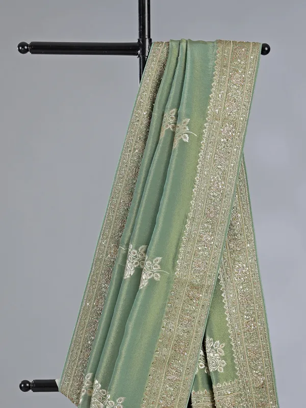 Pista green dola silk saree with zardosi detailing
