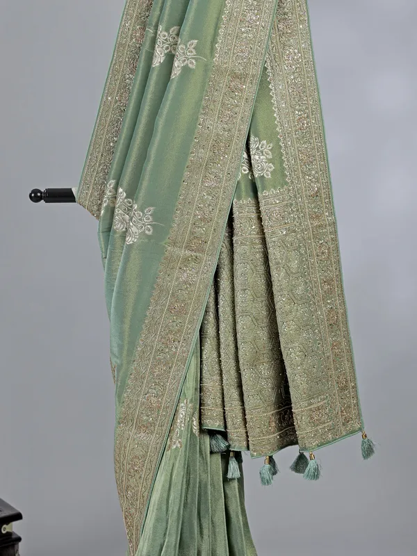 Pista green dola silk saree with zardosi detailing