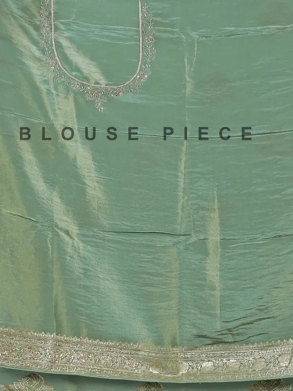 Pista green dola silk saree with zardosi detailing