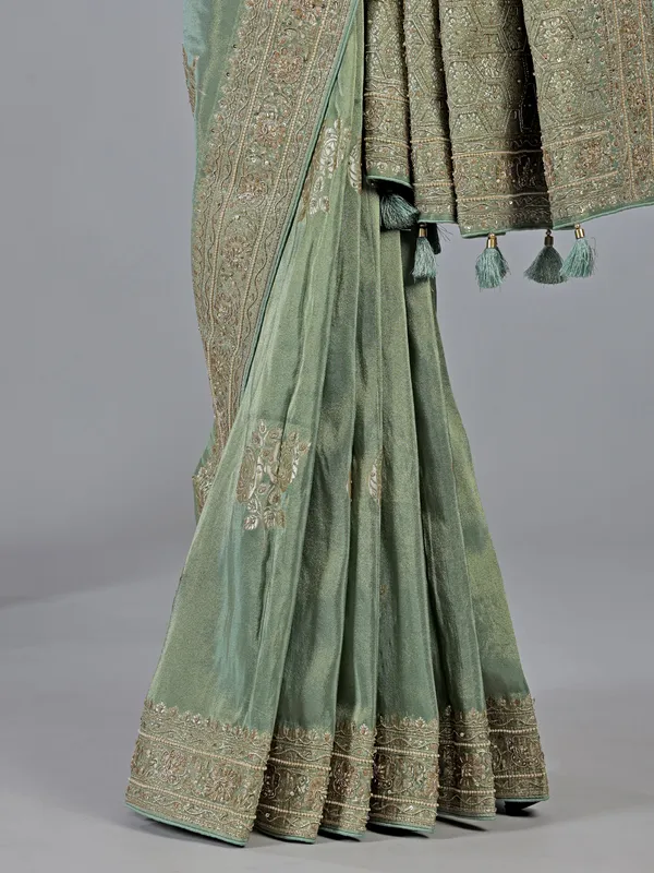 Pista green dola silk saree with zardosi detailing