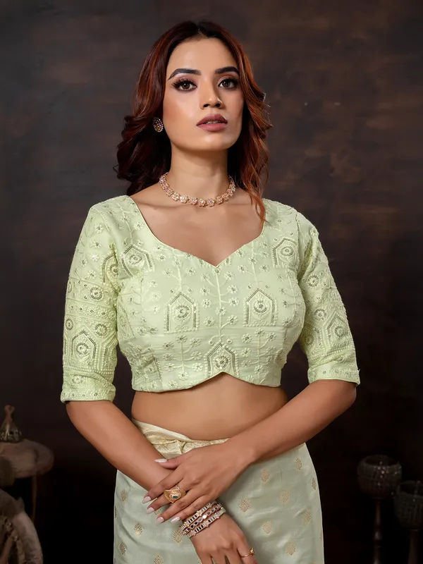 Pista green dola silk saree with zari glow