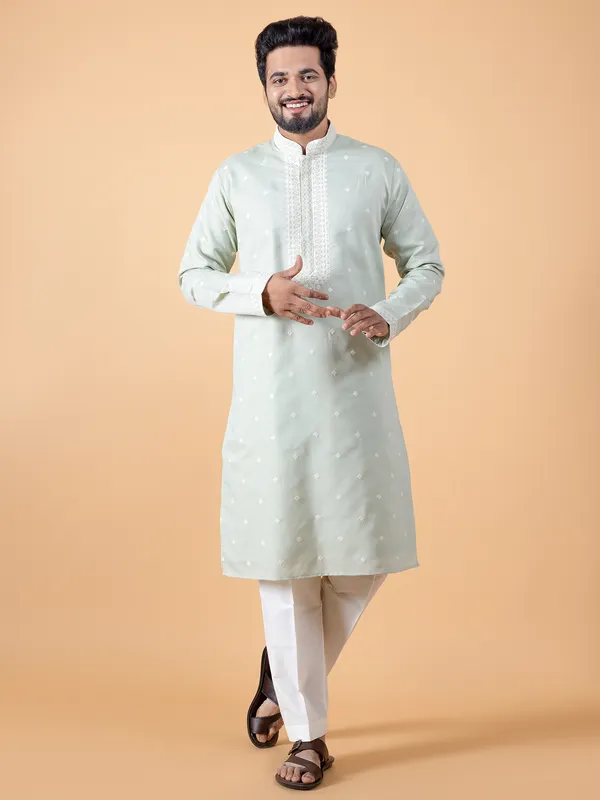 Pista green embroidery kurta suit