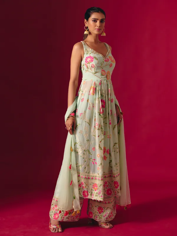 Pista green georgette pakistani style sweetheart palazzo suit