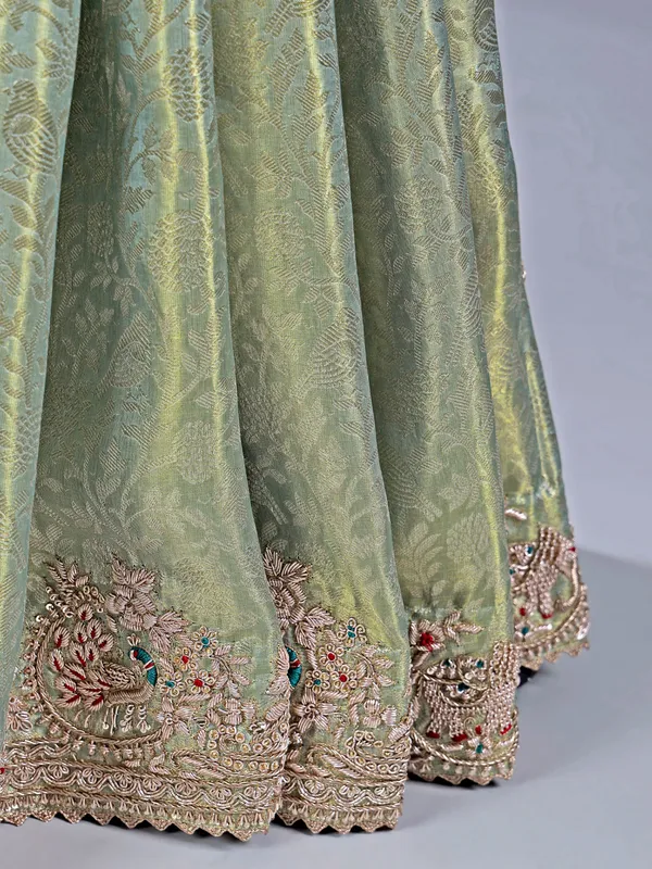 Pista green kanjivaram saree with grand embroidery