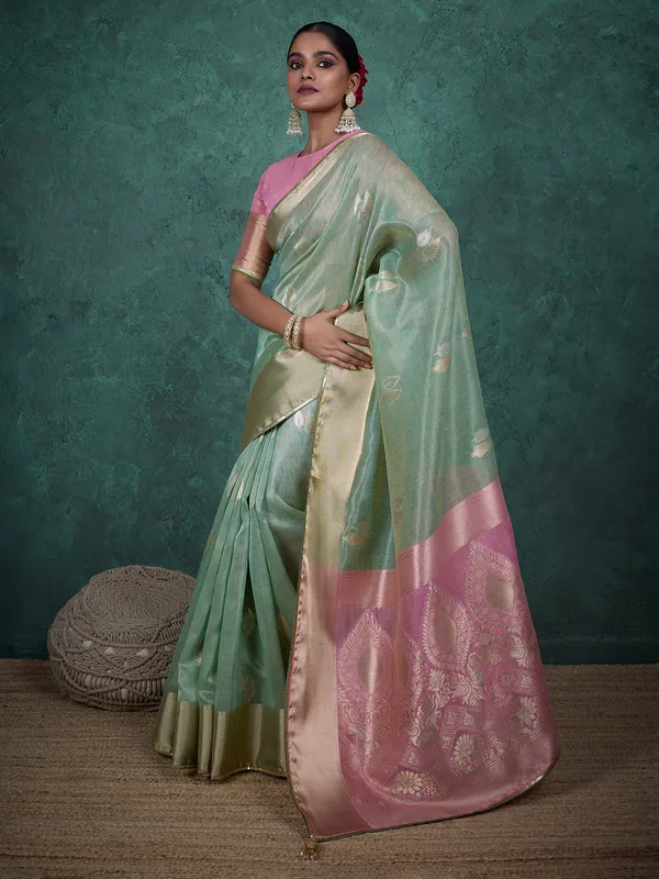 Pista green linen blend saree with zari weaving