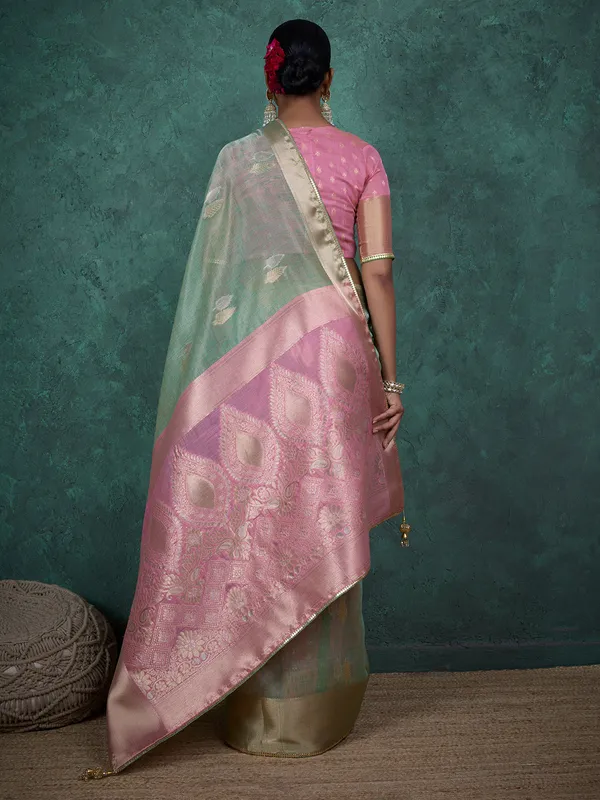Pista green linen blend saree with zari weaving
