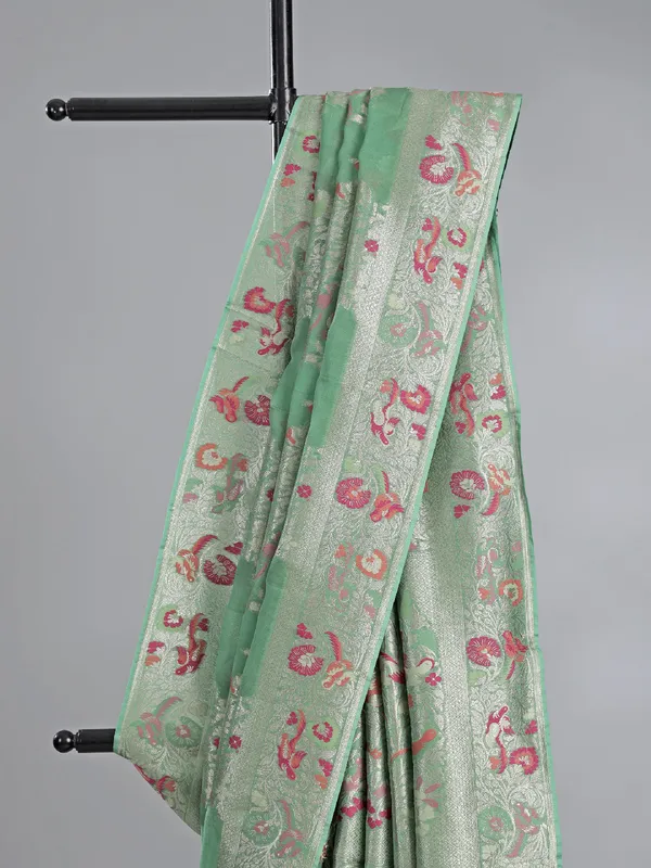 Pista green modal silk saree with colorfull motifs