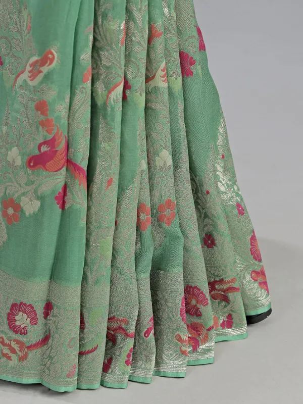 Pista green modal silk saree with colorfull motifs