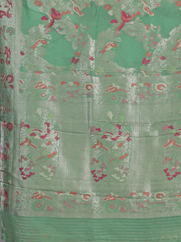 Pista green modal silk saree with colorfull motifs