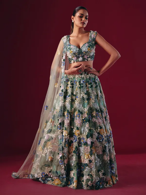 Pista green net lehenga choli with threaded pearl beauty