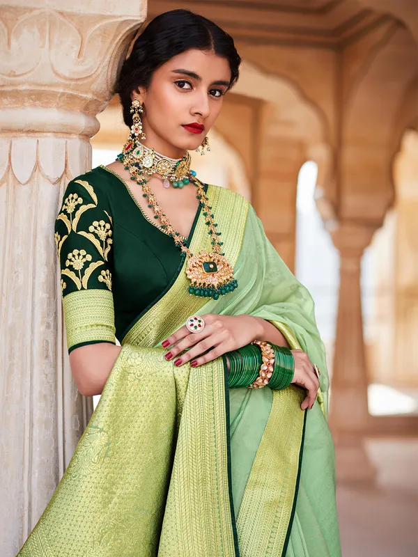 Pista green organza saree for wedding look
