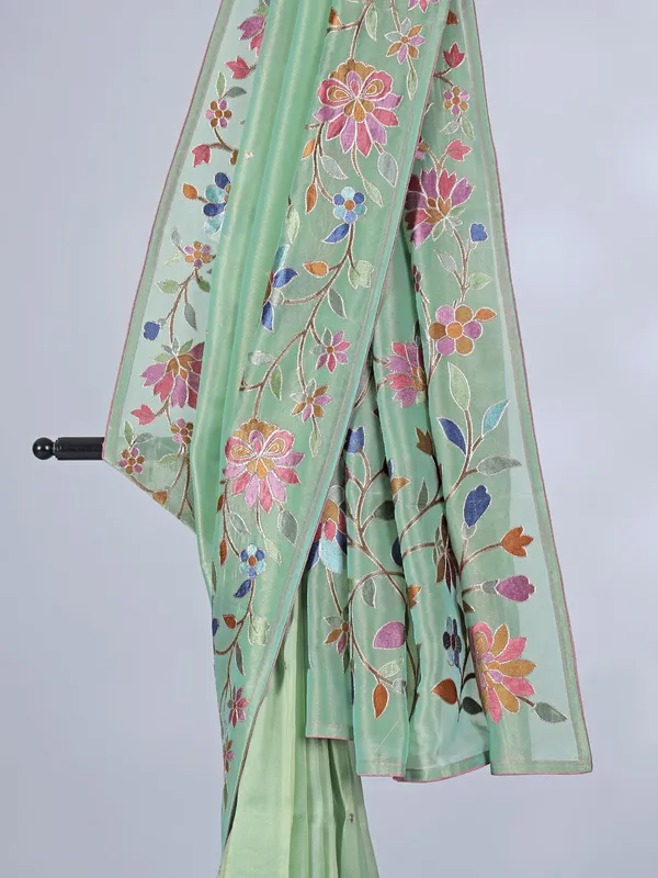 Pista green organza saree with delicate embroidery work