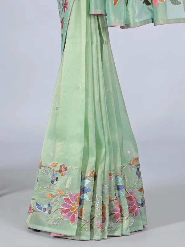 Pista green organza saree with delicate embroidery work