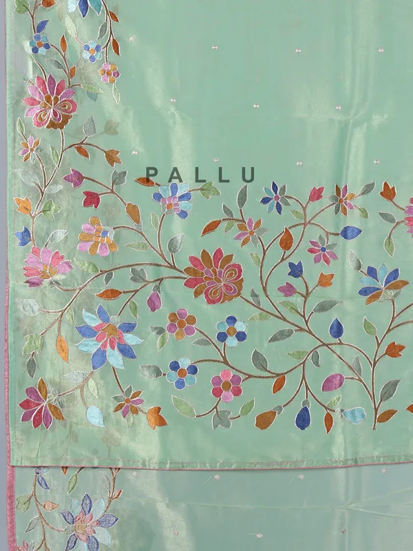 Pista green organza saree with delicate embroidery work