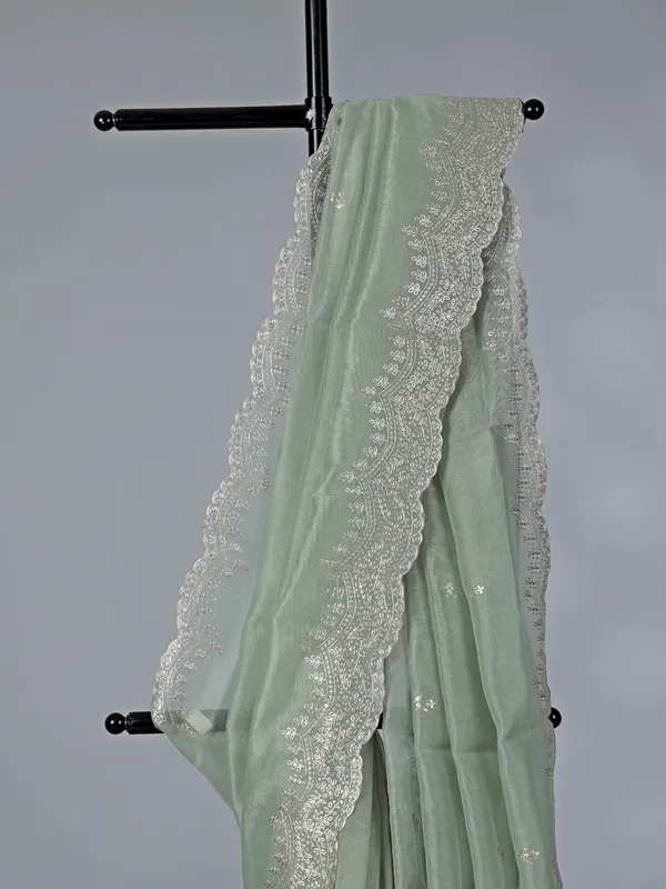 Pista green organza saree with thread work
