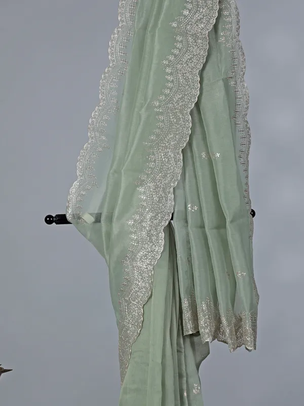 Pista green organza saree with thread work