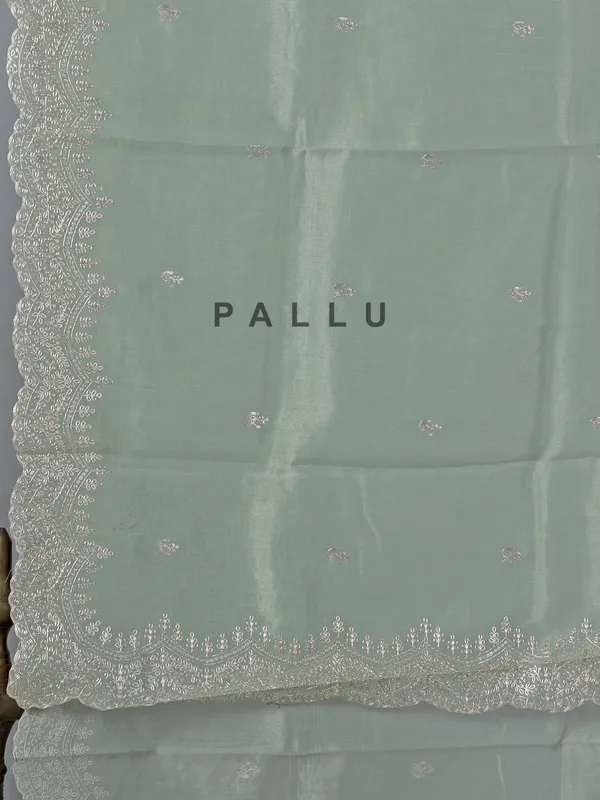 Pista green organza saree with thread work